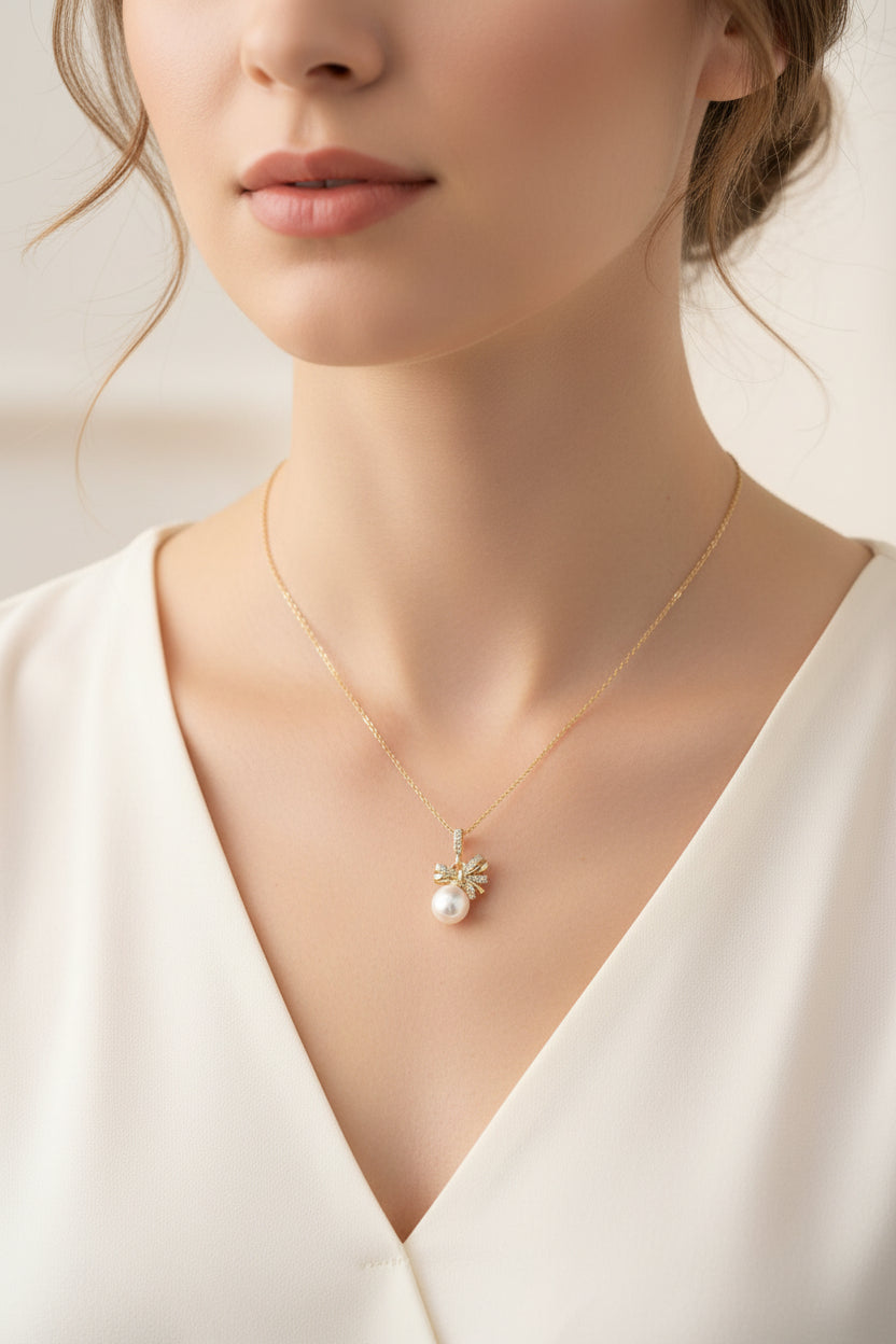 Pear and bow Necklace